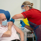 George Dyer, 90, receives a dose of the Pfizer/BioNTech covid-19 vaccine at Croydon University Hospital in south London on December 8, 2020.